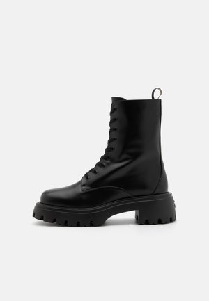 Stuart Weitzman EMERSON LACE-UP - Botines con plataforma - black