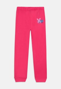 Joggers de algodón rosa con cinturilla elástica, puños ajustados y un diseño gráfico de texto azul en la pierna izquierda.