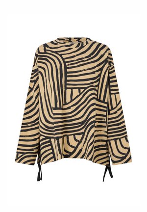 Top beige con motivo a onde nere, maniche lunghe, silhouette ampia, scollatura rotonda, laccetti ai lati dell'orlo, tessuto testurizzato.