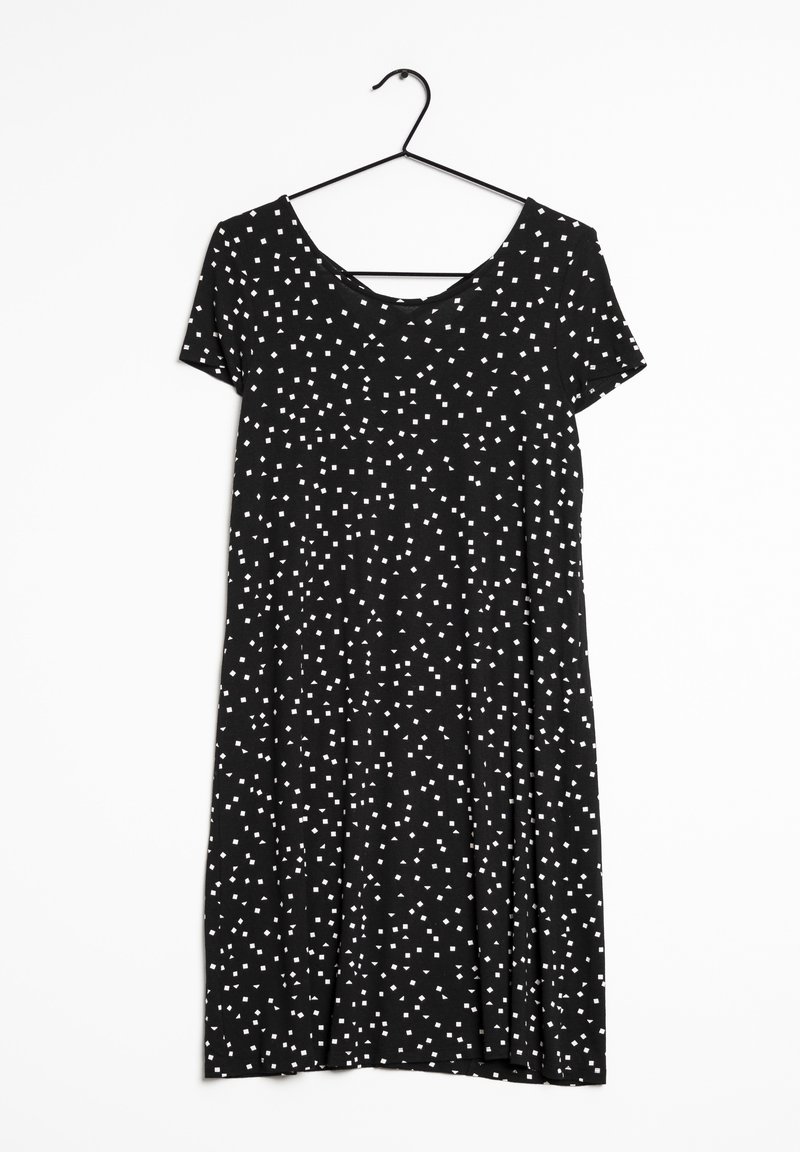 Černé šaty s krátkými rukávy, zdobené vzorem malých bílých čtverců. Měkká tkanina a silueta do A. Zavěšeny na černém háčku.