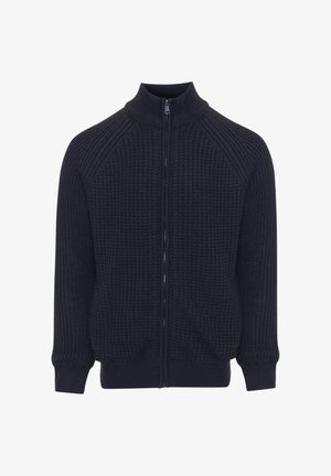 Marineblauwe gestructureerde gebreide trui met een rits aan de voorkant en een hoge kraag. Heeft raglanmouwen en ribgebreide manchetten en zoom.