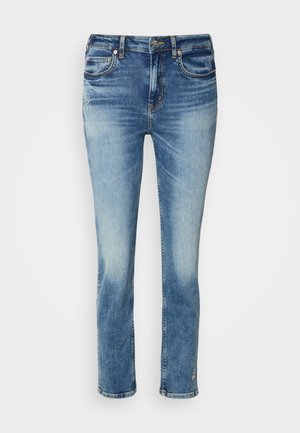Light blue denim jeans featuring a straight leg design, slight fading, five-pocket style, and subtle embroidery near the hem.
