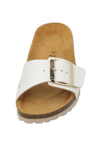 White slide sandal with a textured surface, adjustable metallic buckle, and cork footbed. Rubber outsole with a slight raised edge.
