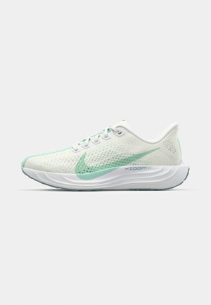 Lightweight running shoe with a white mesh upper and mint green accents, featuring a cushioned sole and streamlined design. ZoomX technology visible.