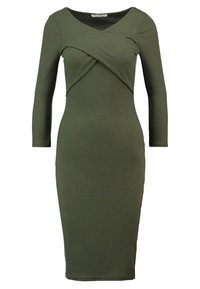 Olive zelené žebrované šaty s dlouhými rukávy, véčkovým výstřihem a zakřiveným předním designem. Přiléhavý silueta s délkou ke kolenům.