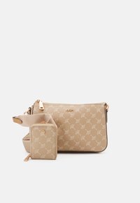 Beige crossbody bag with embossed pattern, gold hardware, and a detachable small pouch. Smooth texture with zip closure and adjustable strap.