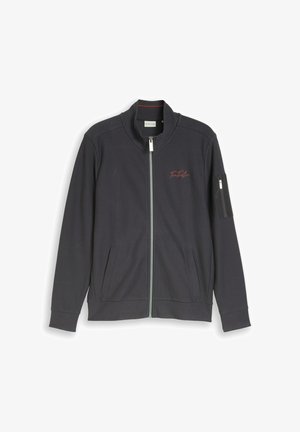 Tumehall täislukuga jakk püstkraega, kahe eesmise tasku, lukuga varruka tasku ja väikese punase tikitud logoga rinnal.