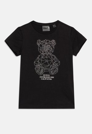 Μαύρο T-shirt με κοντό μανίκι και γεωμετρικό σχέδιο αρκούδου από μικρές στρας, με το κείμενο «GUESS Established 1981 California».