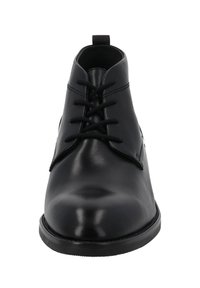 Scarpa da uomo in pelle nera, modello classico con punta arrotondata, chiusura con lacci e cuciture minimaliste. Tessuto liscio e suola in gomma a profilo basso.