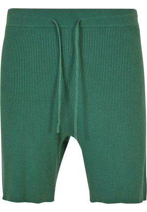 Zielone prążkowane szorty wykonane z miękkiego materiału, z elastycznym pasem na sznurku do regulacji dopasowania. Długość do połowy uda.