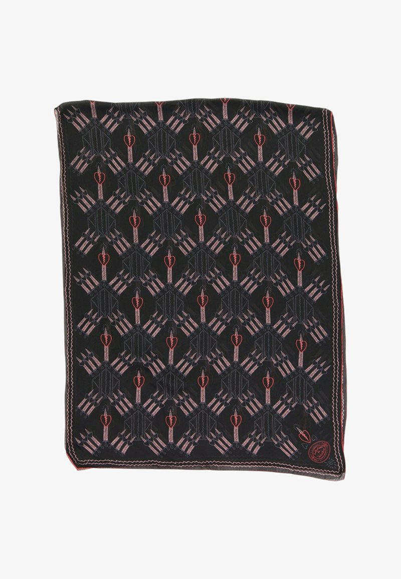 Tissu noir avec un motif répétitif de flèches rouges et roses croisées derrière des formes de cœurs rouges brisés, encadré par une bordure cousue en zigzag.
