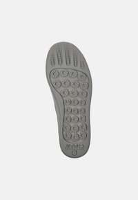 Gray rubber shoe sole featuring a patterned tread with circular indentations and a logo embossed near the heel. Size annotation included.