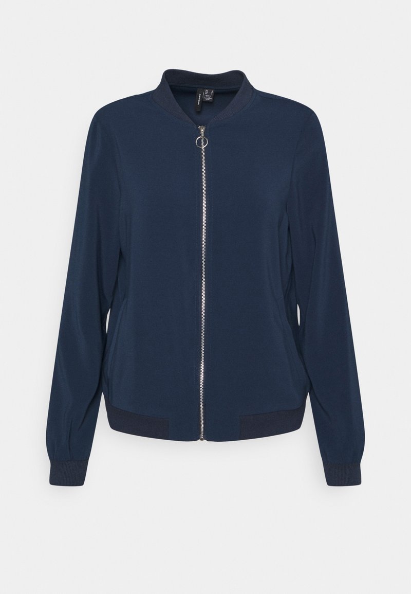 Veste bomber bleu marine avec fermeture éclair argentée à l’avant, col, poignets et ourlet côtelés, présentée sur un fond clair uni.