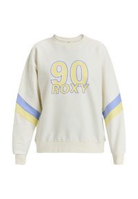 Crewneck sweatshirt in cream with large "90" and "ROXY" graphic in yellow and blue. Features blue and yellow striped accents on sleeves.