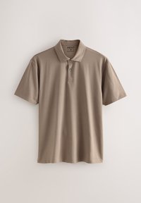 Polo beige en coton avec manches courtes, col et patte à deux boutons. Texture lisse, coupe régulière et détails de couture subtils.