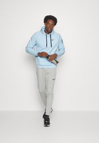 Nike Performance Sweatshirt com capuz - celestine blue/black