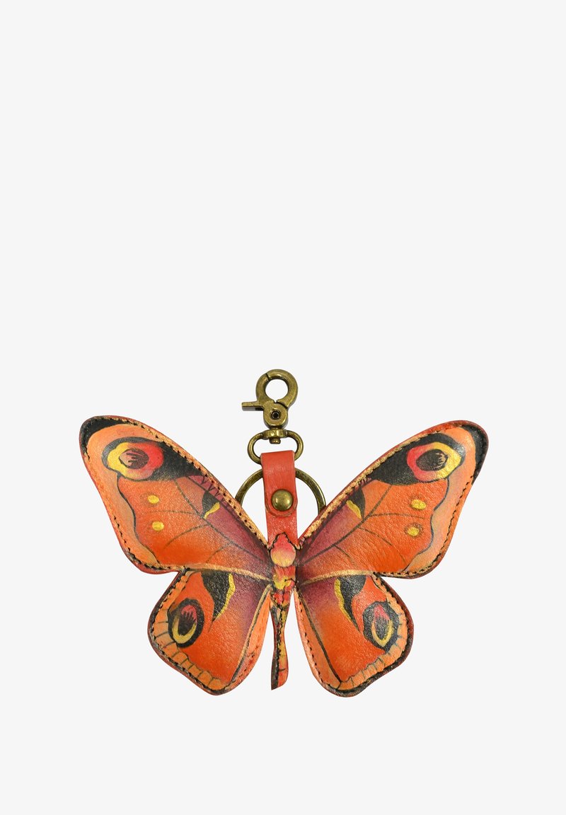 Schlüsselanhänger aus Leder in Schmetterlingsform in leuchtendem Orange mit schwarzen und gelben Akzenten. Mit einem Messingclip und einer roten Lederschlaufe.