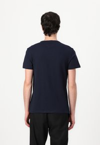 Tommy Jeans SLIM ENTRY GRAPHIC TEE - Camiseta estampada - dark night navy