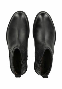 Stivali neri in pelle alla caviglia con una finitura liscia, cerniere laterali e un tacco strutturato. Punta arrotondata e dettagli di cucitura minimi.