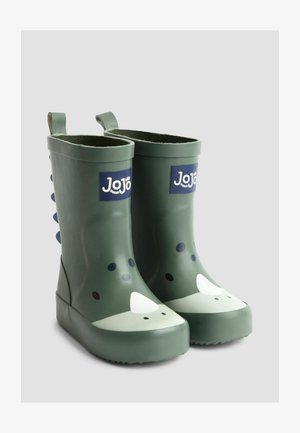 Zelene gumene škornje za dež, s dizajnom dinozavra, ki imajo teksturirano površino, zaobljen prst in kontrastne bele ter črne detajle.