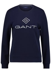 Sudadera azul marino con cuello redondo, mangas largas, puños y bajo de acanalado, que presenta un prominente logotipo blanco de "GANT" en la parte delantera.