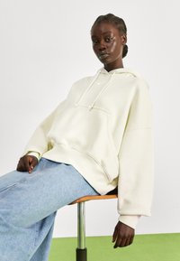 Nike Sportswear HOODIE - Jersey con capucha - off-white