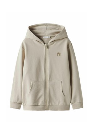 Beige Kapuzenjacke mit Reißverschluss aus Baumwollmischung, mit einer Fronttasche, gerippten Bündchen und einem Logo auf der Brust. Weiche Textur und lässiges Design.