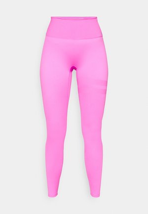 Tett høytliv leggings i livlig rosa. Glatt, elastisk stoff med en subtil strukturert stripe detaljer på siden.