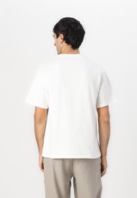 Pal Sporting Goods HOLE GUARD UNISEX - Tričko s potlačou - marshmallow