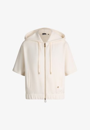 Cremefarbige Kapuzenjacke mit kurzen Ärmeln, Frontreißverschluss, Kordelzug an der Kapuze, Seitentaschen und kleinem runden Logopatch am Saum.