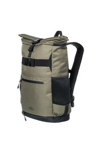 Khaki roll-top backpack with black accents, buckle closure, zippered pocket, mesh side panel, and padded straps for comfort. Water-resistant material.