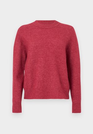 Röd stickad tröja med rund halsringning, långa ärmar och ribbade muddar. Mjuk textur och avslappnad, ledig passform.