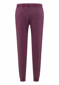 Bordeauxrote Jogginghose mit elastischem Bund, zulaufenden Beinabschlüssen und zwei Seitentaschen; weiche Textur und lässiges Design.