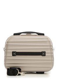 Borsa rigida beige con texture a coste, manico e tracolla neri, e un dettaglio della tracolla frontale. Include una chiusura in metallo argentato.