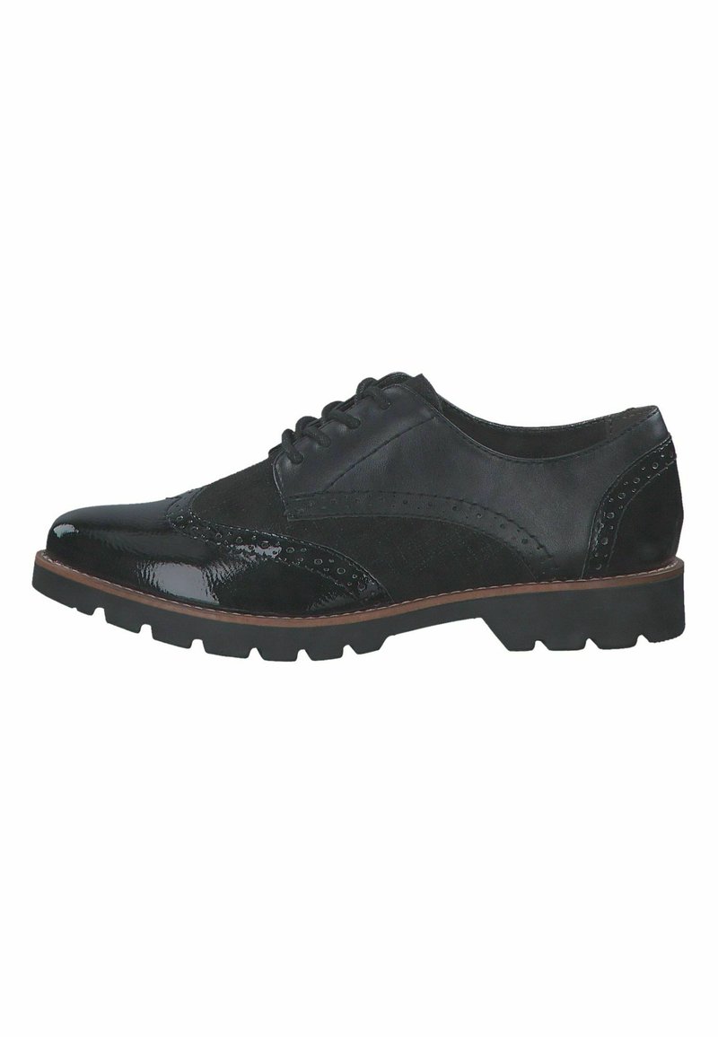 Chaussure brogue pour homme en cuir noir et daim, avec lacets à l'avant et semelle épaisse, vue de côté sur fond blanc.
