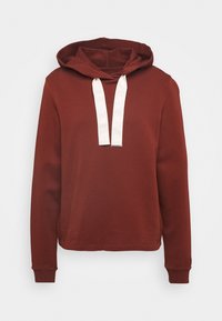 Rust-colored hoodie with a front kangaroo pocket, a lined hood, and white drawstrings. Made of soft fabric with ribbed cuff details.