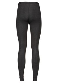 Svarta leggings i texturerad tyg, med en slät midja och avsmalnande ben med åtsittande muddar vid anklarna.