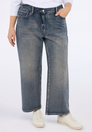 - Jeansy Relaxed Fit