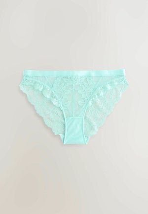 Bragas de encaje verde menta con un borde festoneado, que presentan intrincados patrones florales y una cinturilla suave. Material ligero y transparente.