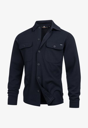 Dunkelblaues Button-up-Shirt aus einem strukturierten Material, mit zwei Brusttaschen und einem klassischen Kragen. Vorderer Knopfverschluss.