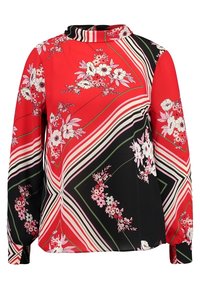 Blusa a righe rossa e nera con motivi floreali, strisce verticali e diagonali, maniche lunghe e collo alto. Texture del tessuto liscia.