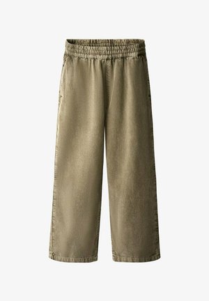 Pantaloni beige in velluto a coste a gamba larga con vita elasticizzata e tasche laterali, progettati per comfort e uso casual.