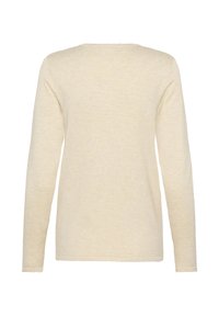 Gara piedurkne krekls, izgatavots no gaiši beigaadītā trikotāžas auduma ar gludu tekstūru un apaļu kakla izgriezumu, ar taisnu apakšmalu un šūtām malām.