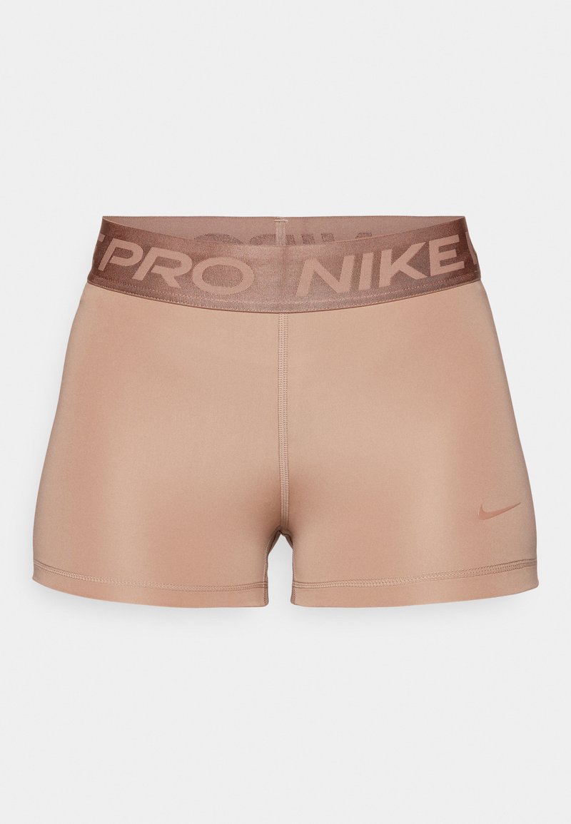 Shorts Nike Pro in marrone chiaro con una ampia vita elastica che presenta il testo "PRO NIKE". Texture liscia e design aderente.
