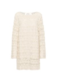 Spetstopp i off-white med långa ärmar, med en vågformad mönstring och en knytning i ryggen. Texturerad, öppen stickad design.