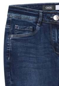 Jeansy dżinsowe w ciemnym niebieskim kolorze o gładkiej teksturze. Posiadają pięć kieszeni, widoczny guzik oraz akcenty w postaci przeszyć. Etykieta marki: CECIL.