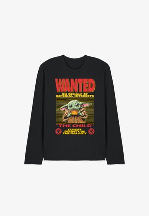Black long-sleeve shirt with a "WANTED" poster design featuring Baby Yoda holding a bowl saying "Still Hungry" and text about a galaxy bounty.