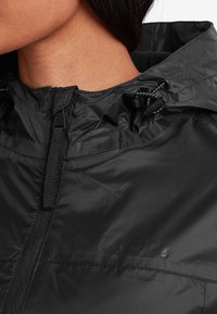 TOG24 CRAVEN - Waterproof jacket - black