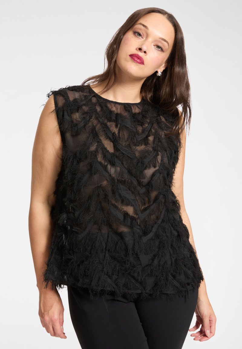Top nero senza maniche con tessuto trasparente decorato da accenti testurizzati simili a piume disposti a zigzag. Vestibilità casual con scollo rotondo.