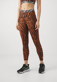 Puma ANIMAL REMIX 7/8 - Leggings - teak